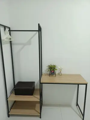 a glass table with a plant on top of it at Dream 3 @ Emerald avenue in Brinchang