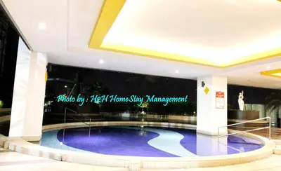 a large swimming pool in the middle of a building at H2H - CY15 @ Majestic Ipoh in Ipoh