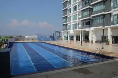 a large swimming pool in front of a building at Pearl Rice Garden Japanese Style \u7c73\u6a02\u574a\u9802\u5c64\u65e5\u5f0f\u9ad8\u7ea7\u516c\u5bd3 in Sekincan