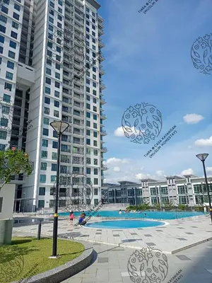a large apartment complex with a swimming pool and two tall buildings at TIARA @ CASA KAYANGAN (MUSLIM HOMESTAY) in Ipoh