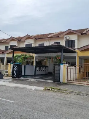 a building with a parking lot with a garage at Ssue Klebang Ipoh Homestay With Complementary Pool & High Speed internet WIFI in Chemor