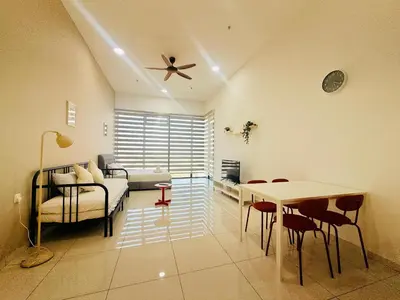 a living room with a couch and a table at New 2BR Georgetown Warm and Lovely Homestay 10pax-\u65e0\u654c\u7f8e\u666f\u4e24\u623f\u6c11\u5bbf Beacon Executive Suite in George Town
