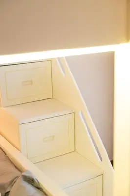 a room with white drawers and a bed at Fantasy Funland Retreat by The Only Bnb in Tanjong Tokong