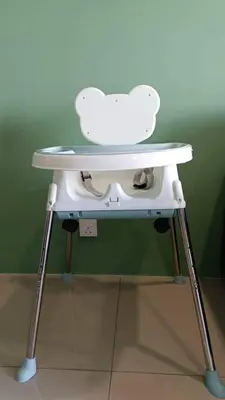 a white high chair with a stuffed animal on it at Ipoh The Cove Elegant Homestay Tambun in Ipoh