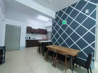 a kitchen and dining room with a table and chairs at Golden Hills Pasar Malam 3 Bedroom Apartment J LouvRe in Tanah Rata