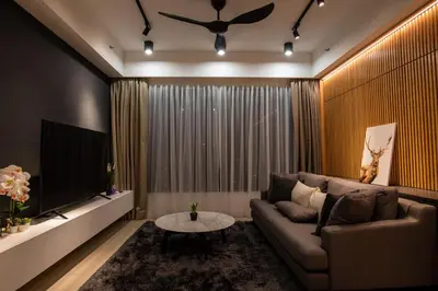 a living room with a couch and a table at Executive Seaview 2Bedrooms Macalister Georgetown 4-6pax in George Town