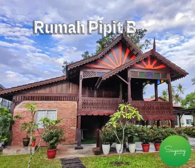 a house with a gambrel roof at Sayang Di Kaki Bukit Homestay Near Icon City Bukit Mertajam in Bukit Mertajam