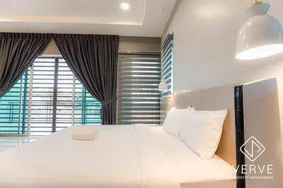 a bedroom with a large white bed and a large window at Ipoh MJ Boutique House by Verve (20pax) EECH79 in Ipoh