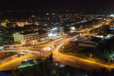a city lit up at night with street lights at Pearl Rice Garden \uff08cottage style\uff09\u7c73\u6a02\u574a\u9802\u5c64\u7530\u56ed\u5f0f\u9ad8\u7ea7\u516c\u5bd3 in Sekincan
