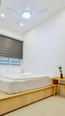 a large bed in a room with a window at [Muji-Style Apartment] @ Cameron Jaya (3R2B) 8 pax in Tanah Rata