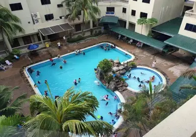 an overhead view of a swimming pool at a hotel at CORAL BAY APARTMENT 3room (Ocean apartment) in Pangkor
