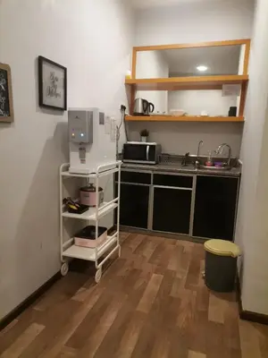 a kitchen with a sink and a microwave at Dzulstudio(Muslim) Nova Highland in Brinchang
