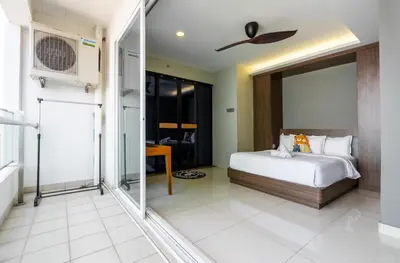 a bedroom with a bed and a ceiling fan at Mansion One Executive Bathtub 1Bedroom 2-4pax in George Town