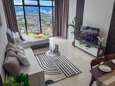 a living room with a couch and a tv at Georgetown#Beacon Executive Suite SkyPool#Luxury&Glamorous Suite#2BR#Living Room with Queen Bed in George Town