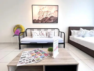 a living room with a couch and a coffee table at Georgetown#Beacon Executive Suite SkyPool#Luxury&Glamorous Suite#2BR#Living Room with Queen Bed in George Town