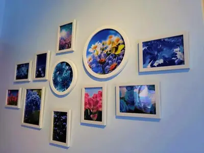 a wall with a bunch of pictures on it at WOODSBURY PREMIER LUXURY SUITE 2B2R 2MIN SUNWAY in Butterworth