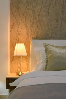 a bedroom with a bed and a lamp on a table at 2R1B/Seaview Tropical /1~8Pax/Gurney Mansion One in George Town