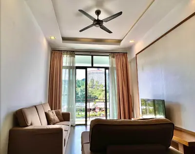 a living room with a ceiling fan and a couch at NEW 6pax 3BR Sunrise view 100m Attractive Places Kea Farm in Cameron Highlands