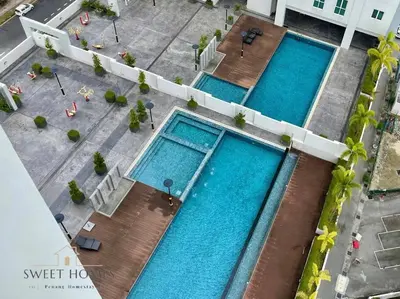 an overhead view of three large swimming pools at Pool View Stylish Suite at Jelutong Penang 1-4pax in George Town