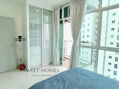 a bedroom with a bed and a large window at Pool View Stylish Suite at Jelutong Penang 1-4pax in George Town