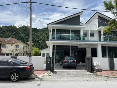a house with two cars parked in front of it at LOW SEASON PROMOTION! 4B12B Mountainville Bungalow in Ipoh