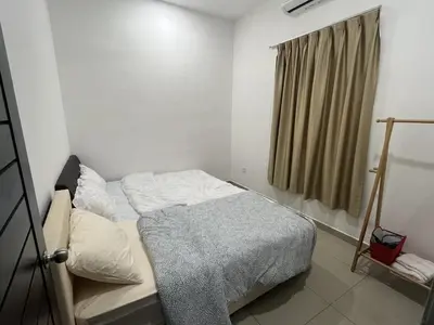 a small bedroom with a bed and a window at LOW SEASON PROMOTION! 4B12B Mountainville Bungalow in Ipoh