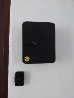 a switch on a white refrigerator with a black button at Batu Ferringhi Luxury Seaview Suite - 3Br in Batu Ferringhi