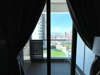 a view from a hotel room window of a city at Blue Aesthetic Luxury Seaview 3 min Drive Sunway in Butterworth