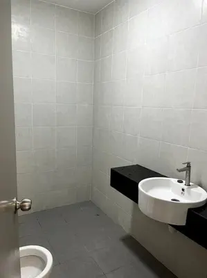 a bathroom with a sink and a toilet at Azzalea Homes 6 @ Taman Golden Hills Cameron Highlands in Tanah Rata