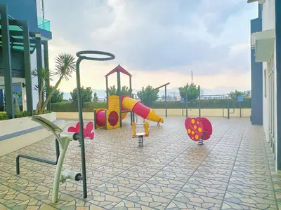 a playground with a slide at The Majestic Ipoh Town by 178homestay in Ipoh