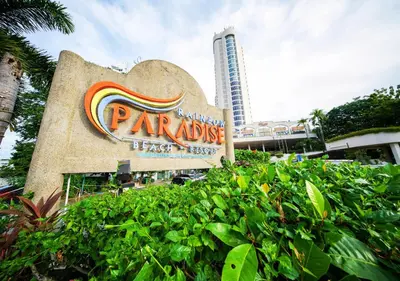 a sign in front of a park with a building at Rainbow paradise at Tanjung Bungah in Tanjung Bungah