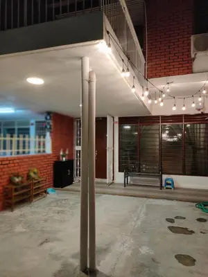 a large room with a pole in the middle of it at Landed Home near Gurney and Georgetown for 18pax WL in George Town
