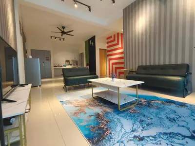 a living room with a couch and a table at Pavilionvillie M1T584 by irainbow in Simpang Pulai