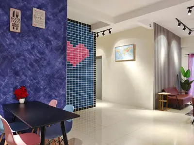 a dining room with a table and blue tiles at Pavilionvillie M1T571 by irainbow in Ipoh