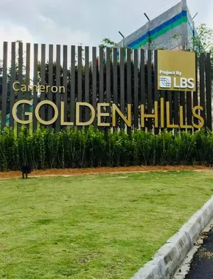 a sign for the colombian colombian hills at 1 Bedroom Apartment @ Golden Hills Cameron Highlands Pasar Malam in Cameron Highlands
