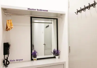 a mirror on a counter in a bathroom at H2H - CosyStay @ Majestic Ipoh Town Central in Ipoh