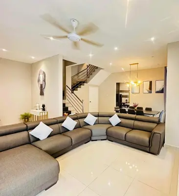a living room with a couch and a ceiling fan at \u300aUntitled HomeStay\u300bSitiawan in Sitiawan