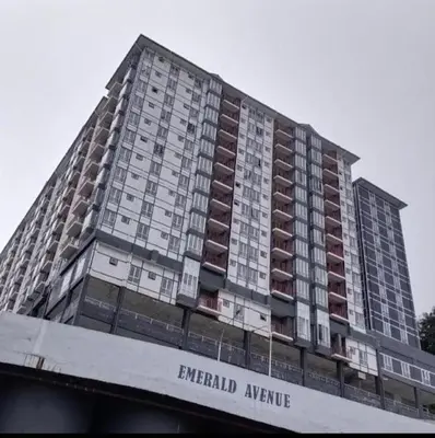 a tall apartment building with the words emerald avenue at Stobericekelathomestay in Cameron Highlands