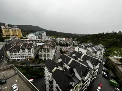 an aerial view of a city with buildings at Stobericekelathomestay in Cameron Highlands