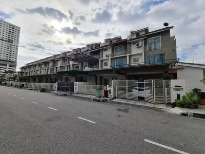 a large apartment building on the side of a street at 3Storey House 13Pax Family Suite in Bayan Lepas