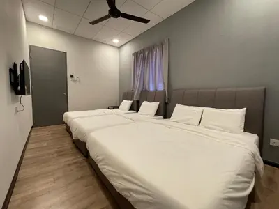 two large beds in a room with a window at NEW 20PX 5BR V KTV & JACUZZI SPA & POOL TABLE at TOWN CENTER & USM - kids pool no more in Gelugor