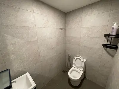 a bathroom with a toilet and a sink at NEW 20PX 5BR V KTV & JACUZZI SPA & POOL TABLE at TOWN CENTER & USM - kids pool no more in Gelugor