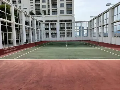 a tennis court in front of a building at Perfect Marina Stay@ Strait Quay 5 pax w/ Free Carpark in Bagan Jermal