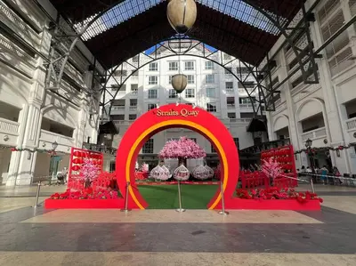 a display in a building with pink flowers on display at Perfect Marina Stay@ Strait Quay 5 pax w/ Free Carpark in Bagan Jermal