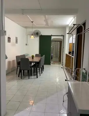 a dining room with a table and chairs at Homestay Idaman Private Pool Mslim in Kuala Kangsar