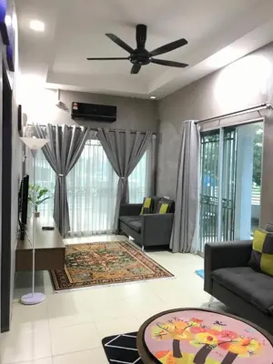 a living room with a couch and a ceiling fan at Fidaiy Homestay in Teronoh