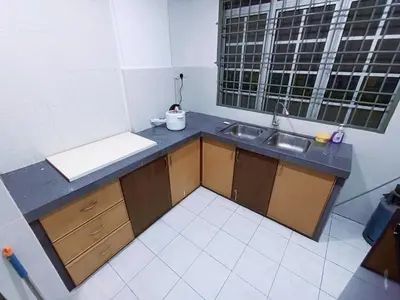 a small kitchen with a sink and a window at Cozy 3 Bedroom Apartment Bandar Perda BM in Bukit Mertajam