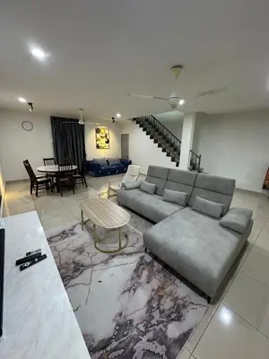 a large living room with a couch and a table at Ulike~home stay~Setia residen~4room in Kampong Selamat