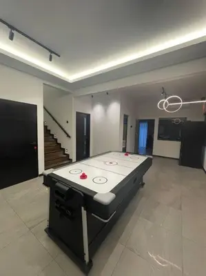 a large room with a table in the middle of it at 5000 SQFT BRAND NEW Semi-D Hype Home 10pax in Ipoh