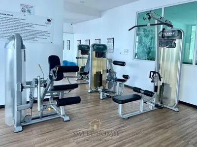 a gym with several treadms and cardio machines at HolidayCozy StraitsGardenSuite Penang#6pax#family in George Town